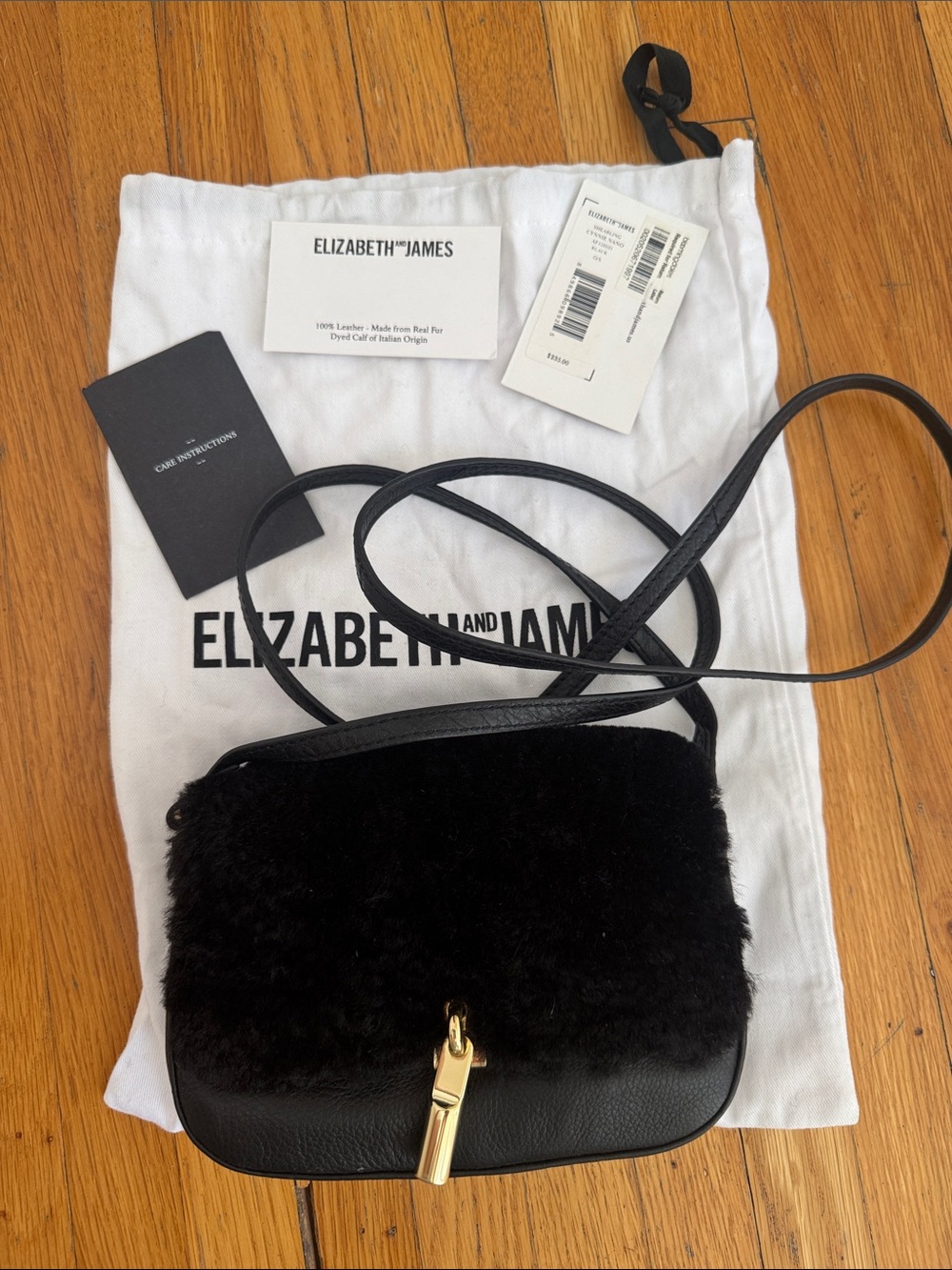 Elizabeth and James NWT Cynnie shearling nano crossbody bag in black.